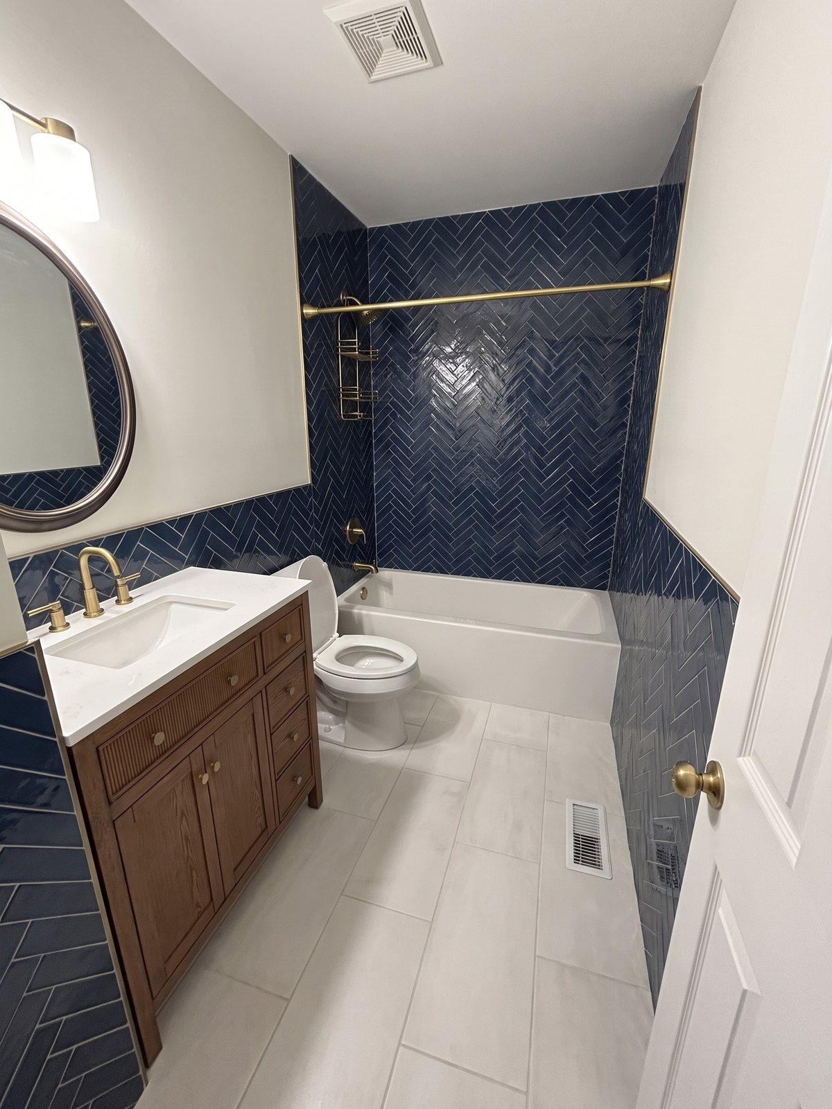 The same bathroom rendered in Coastal Navy