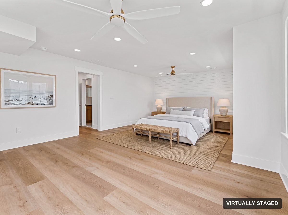 Primary bedroom virtually staged with furniture
